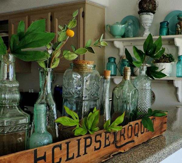 Vintage Bottles with Greenery