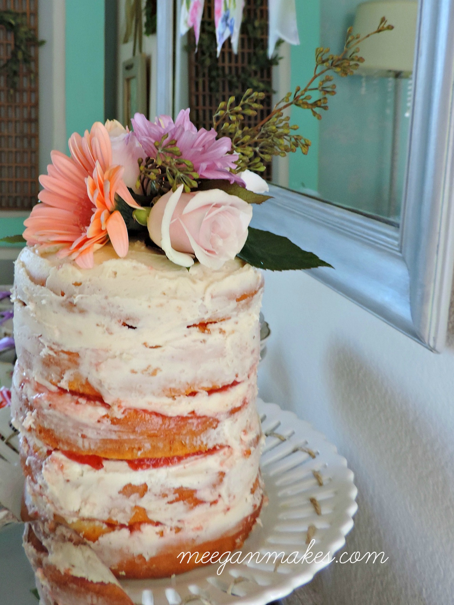 Naked-Cake-with-Butter-Cream-Frosting-and-Raspberry-Filling