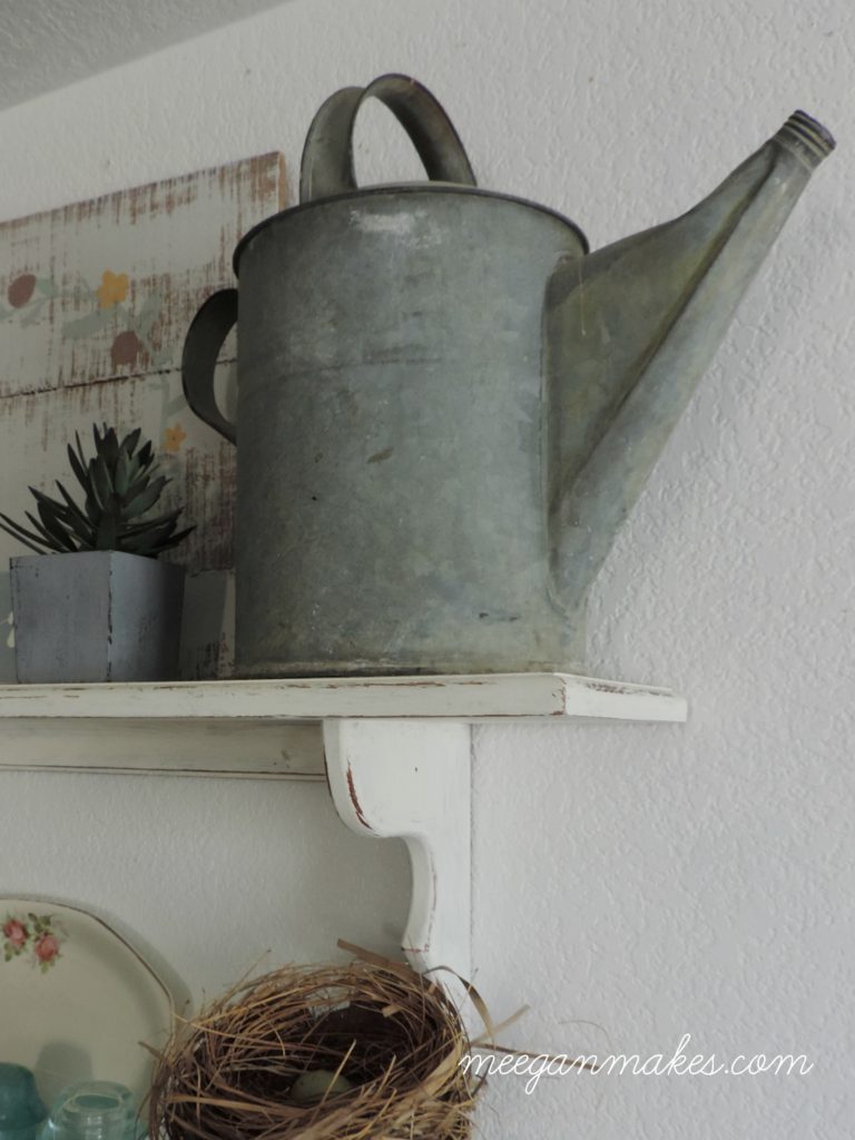 Galvanized Watering Can On Open Shelves